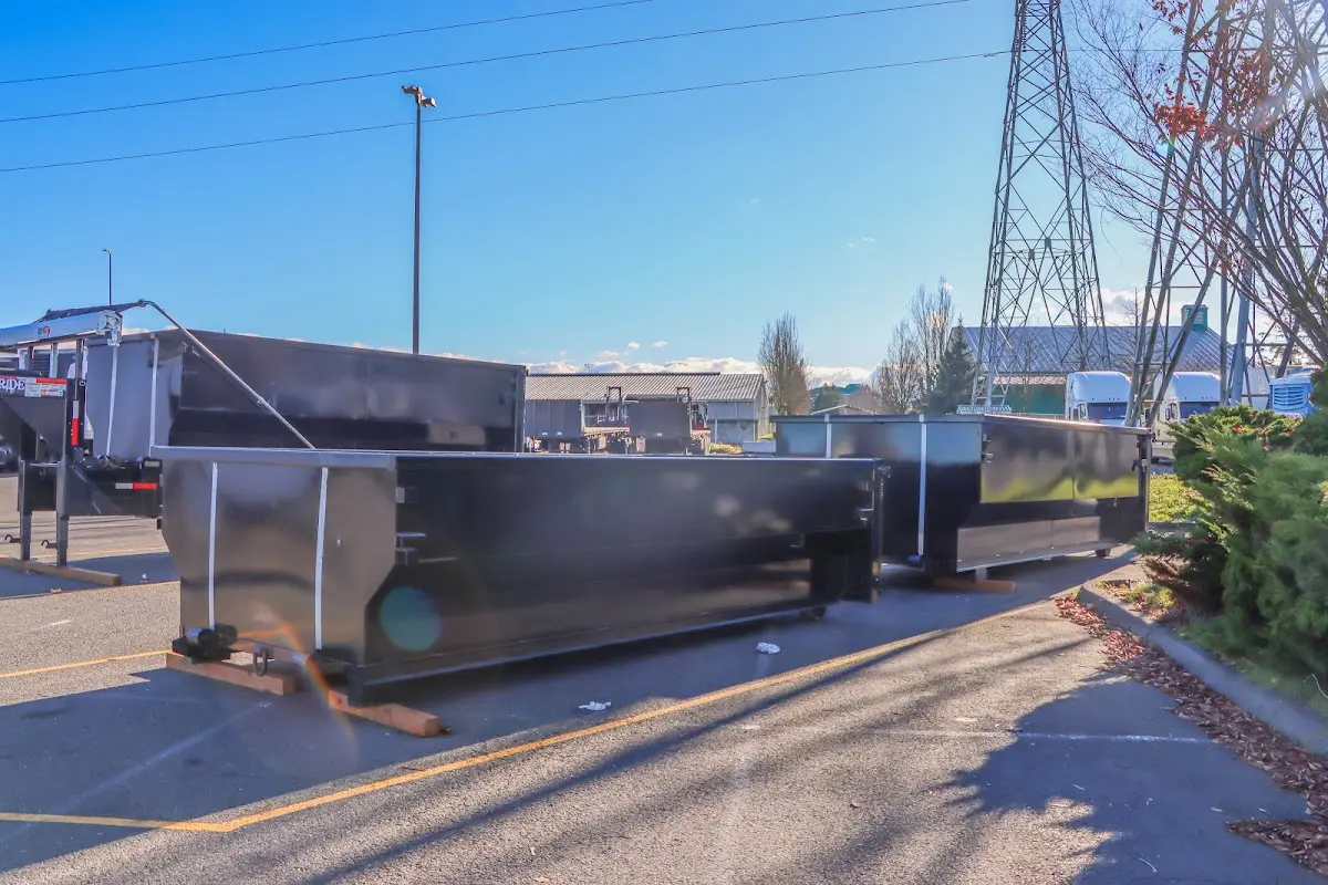 Roll-off dumpster ready for waste disposal at job site for 12 Yard Dumpster Rental in Keene